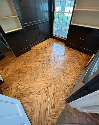 Custom herringbone hardwood floor installation