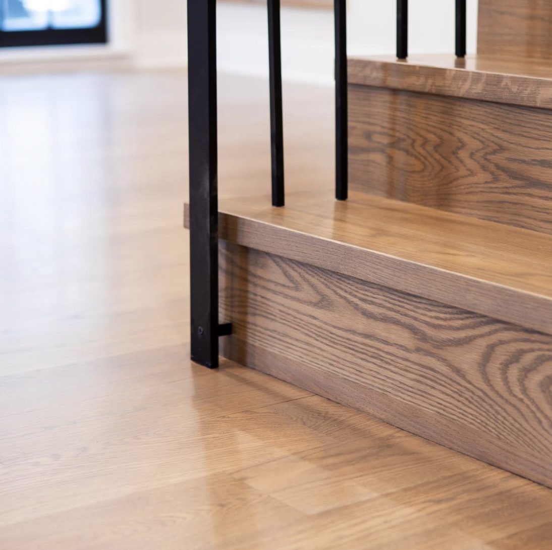 Detail of refinished hardwood staircase in a Lakewood home